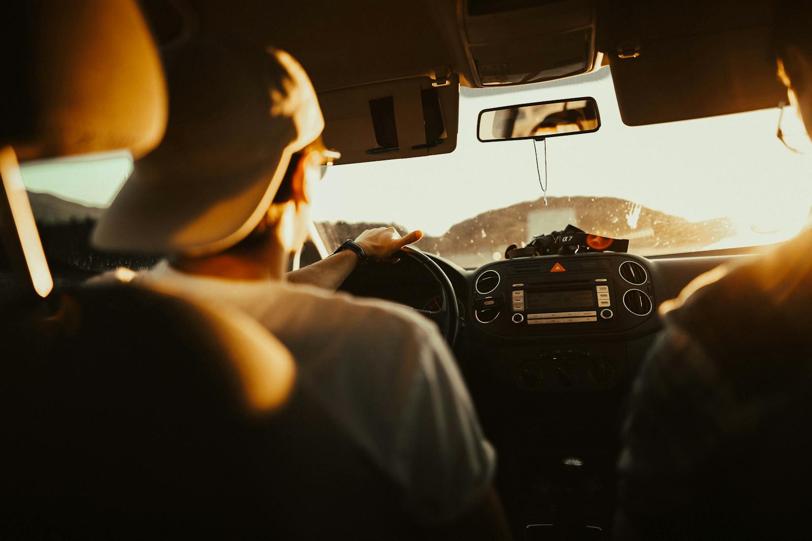 Man Holding the Steering Wheel While Driving, auto insurance